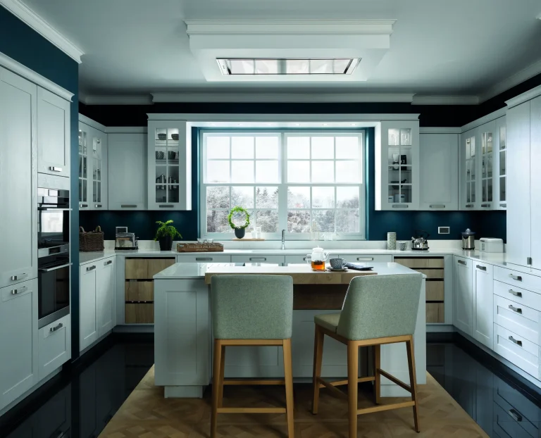 Sage shaker kitchen with island and window